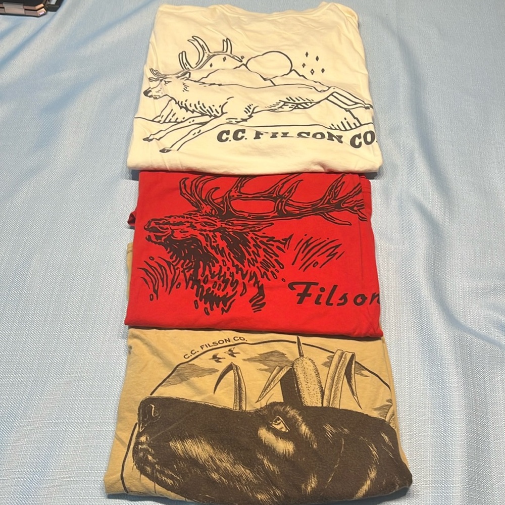 Lot of three Filson MADE IN USA graphic t-shirts. All size L.